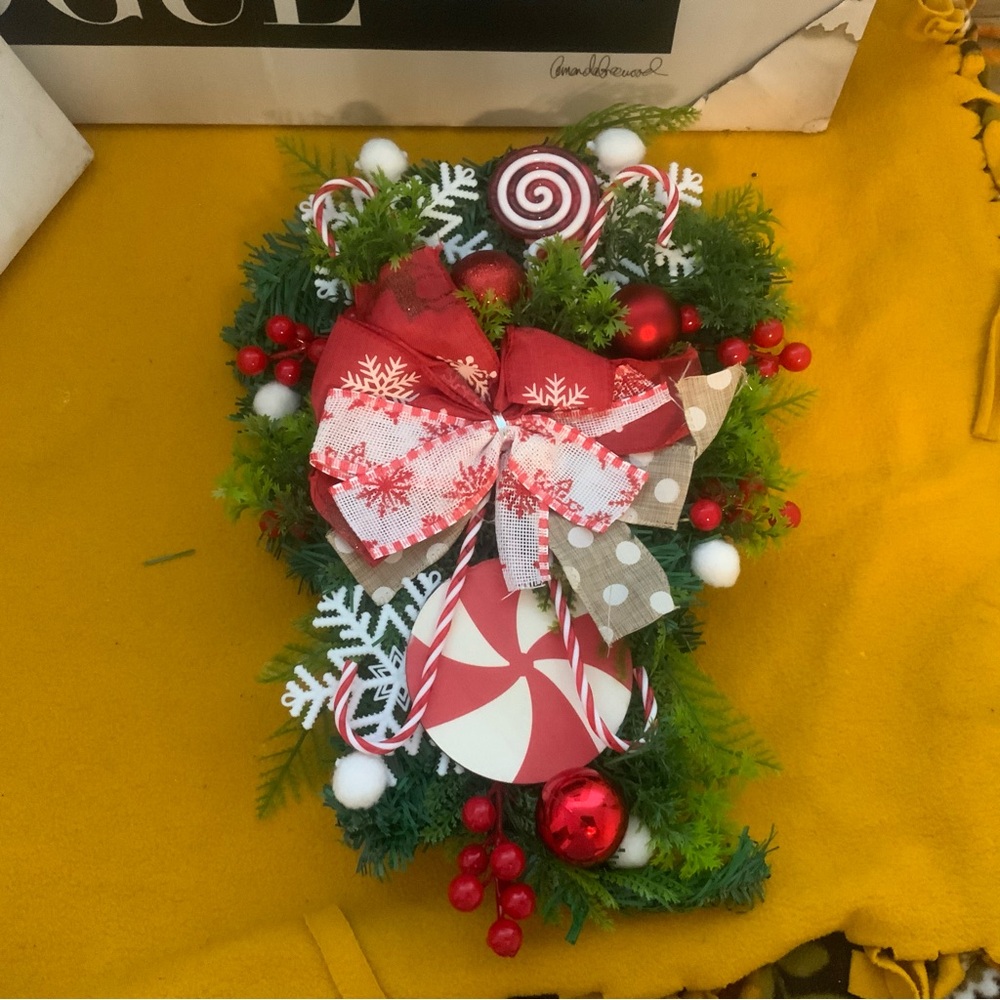 Holiday artificial Christmas teardrop swag for inside or outside decoration
